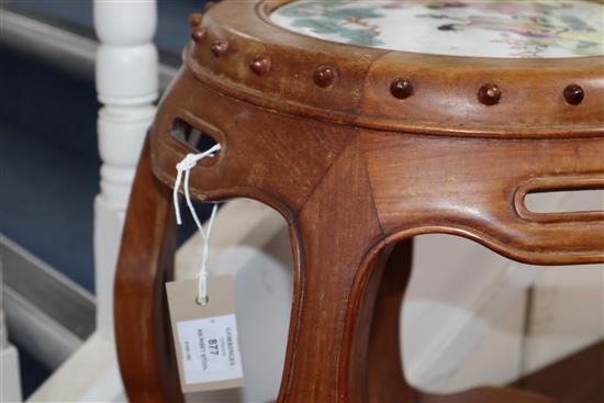 A Chinese hardwood porcelain inset stool W.40cm